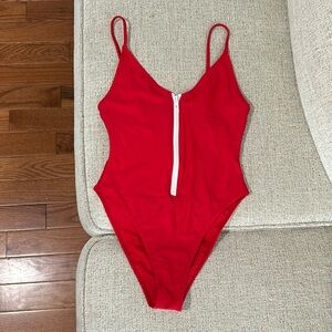 Never used red thigh high one piece